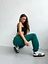 Брюки женские из футера с начесом / изумруд макси